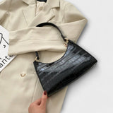Glänzende Lederhandtasche Olivia