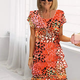 Brigitte – Elegantes, fließendes Kleid mit Volants
